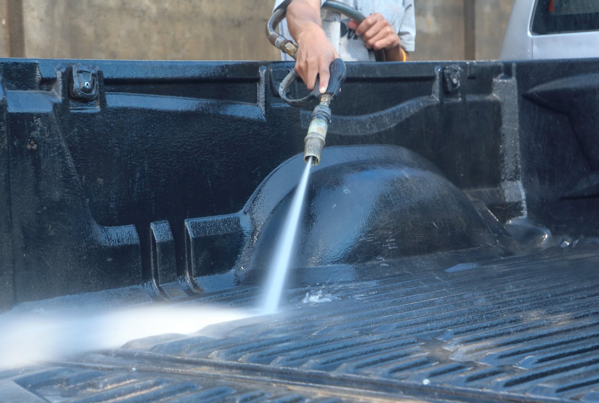 Wash the truck with a high-pressure washer