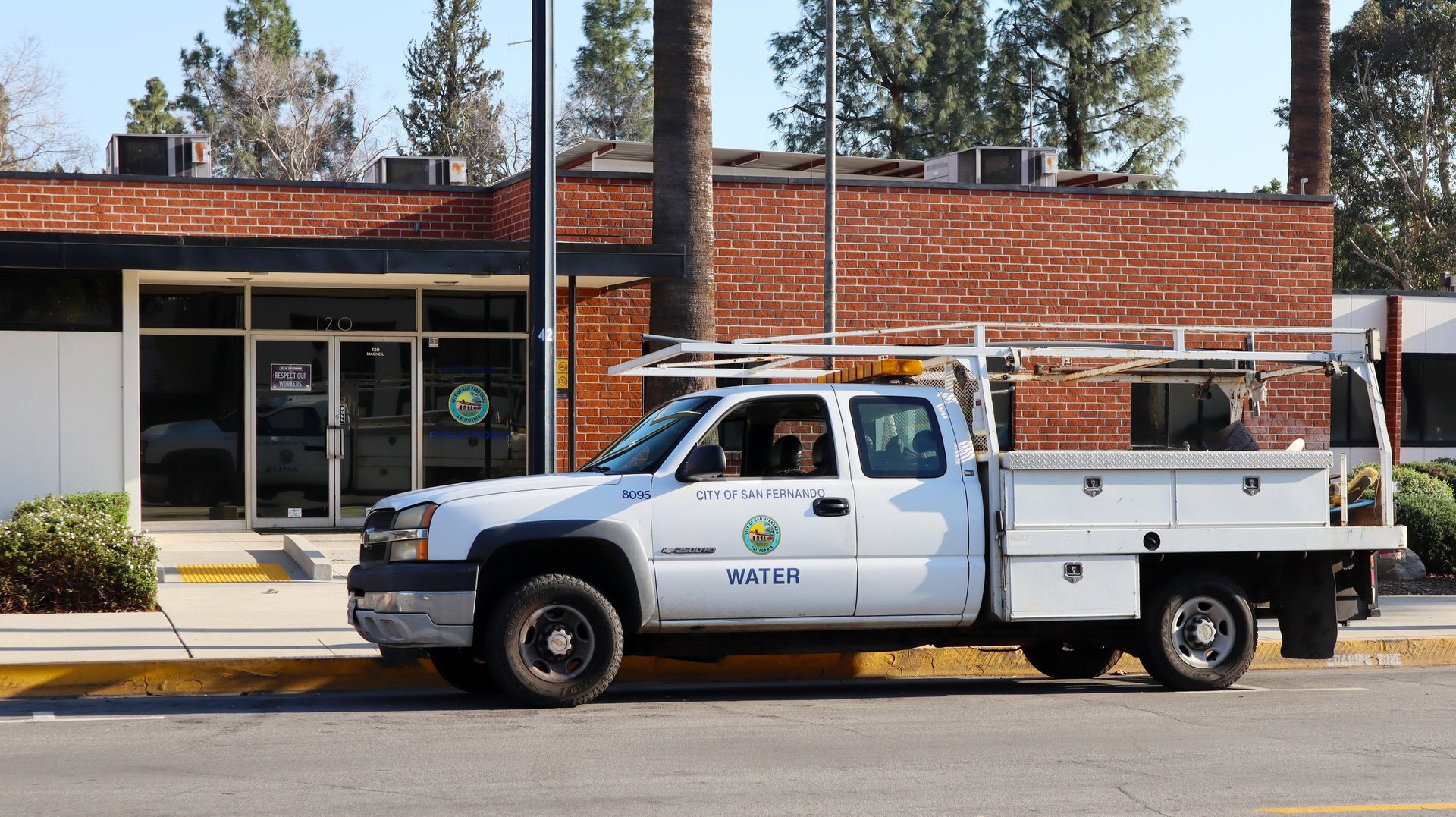 Water service truck at public works facility municipal vehicle